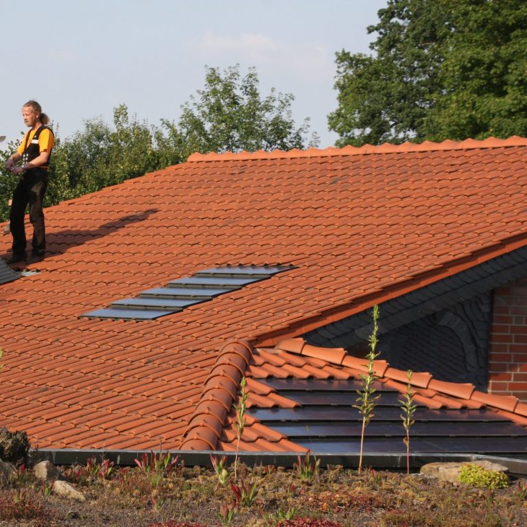 Bild des Sachverständigen auf dem Dach